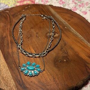 Elegant Blue and Silver Necklace with Flower Pendant